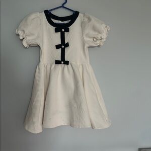 Elegant Cream Kids Dress with Black Accents